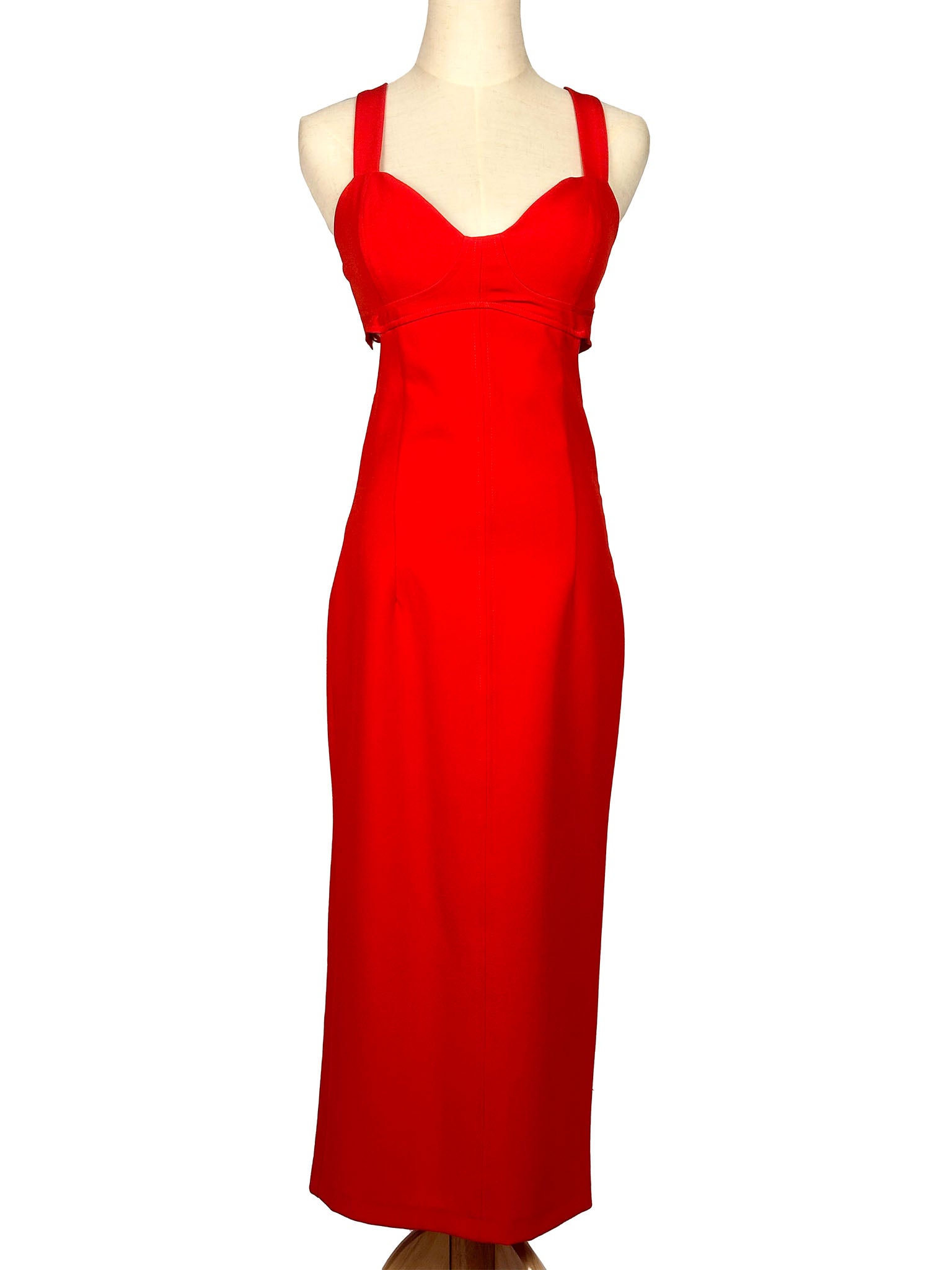 Red dress on a mannequin against a white background