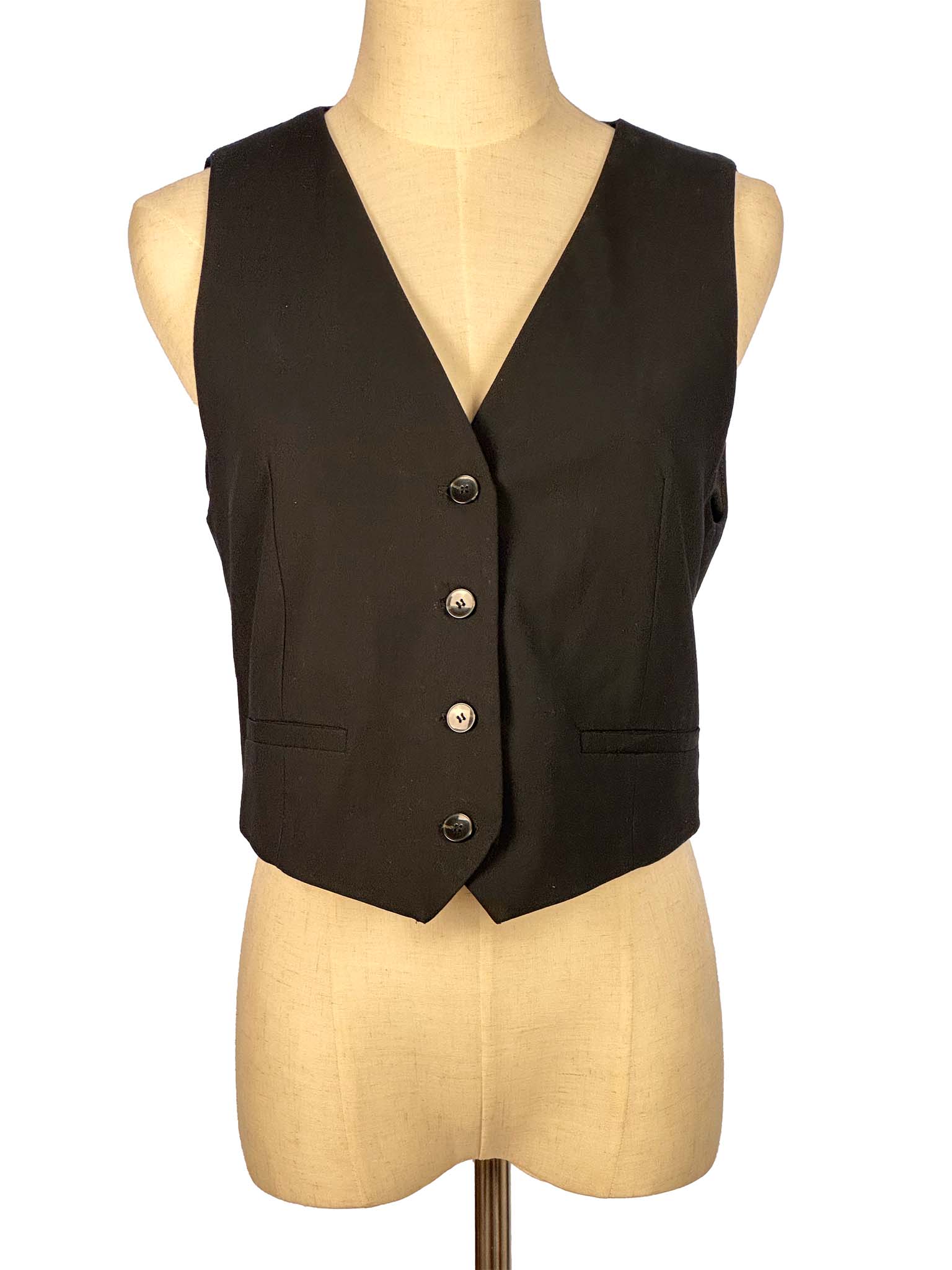 Black vest on a mannequin with a white background