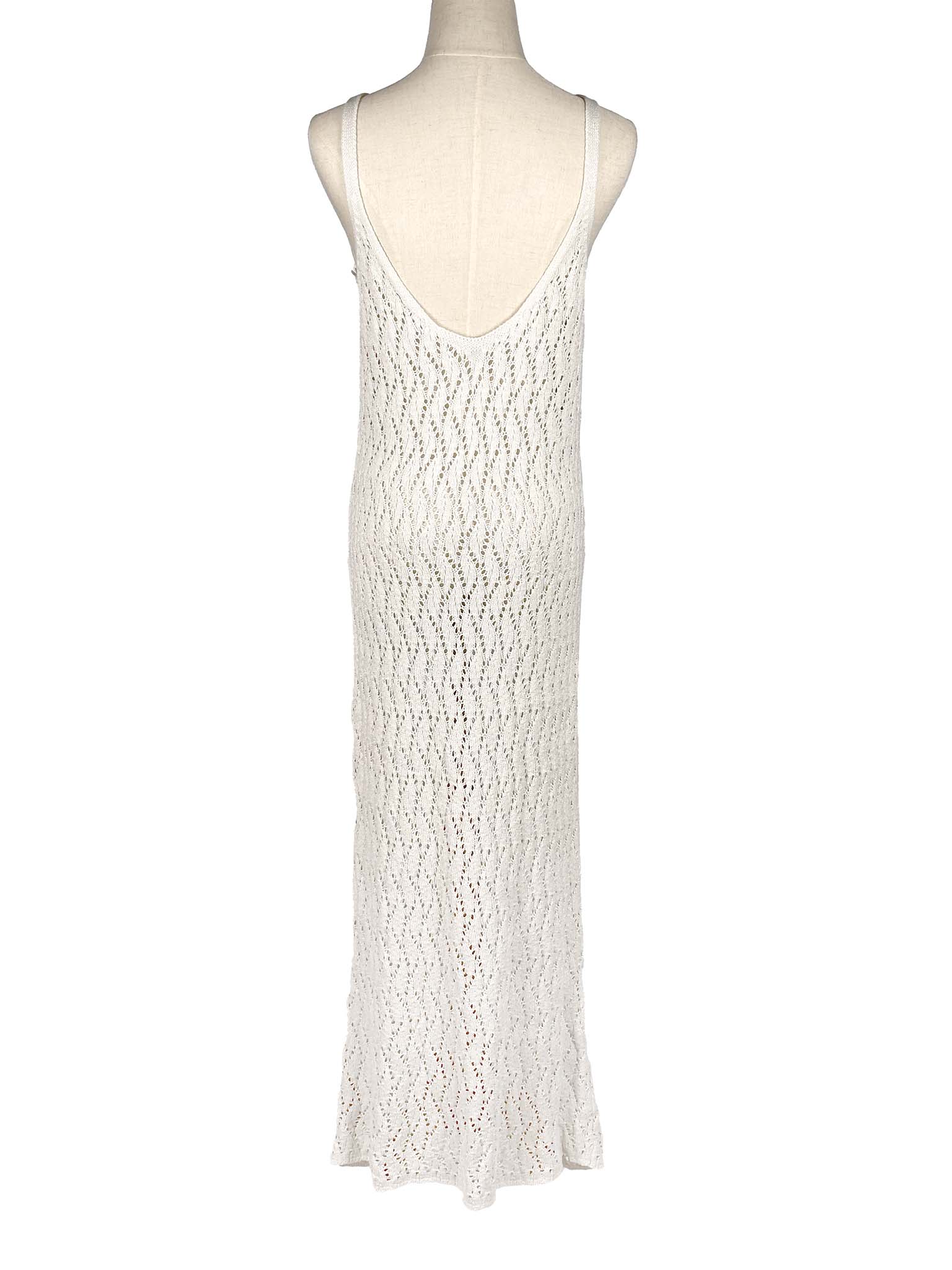 White lace dress on a mannequin against a white background