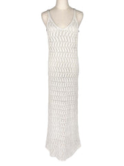White crochet dress on a mannequin against a white background