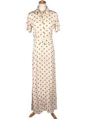 Long Zara polka dot dress on a mannequin against a white background