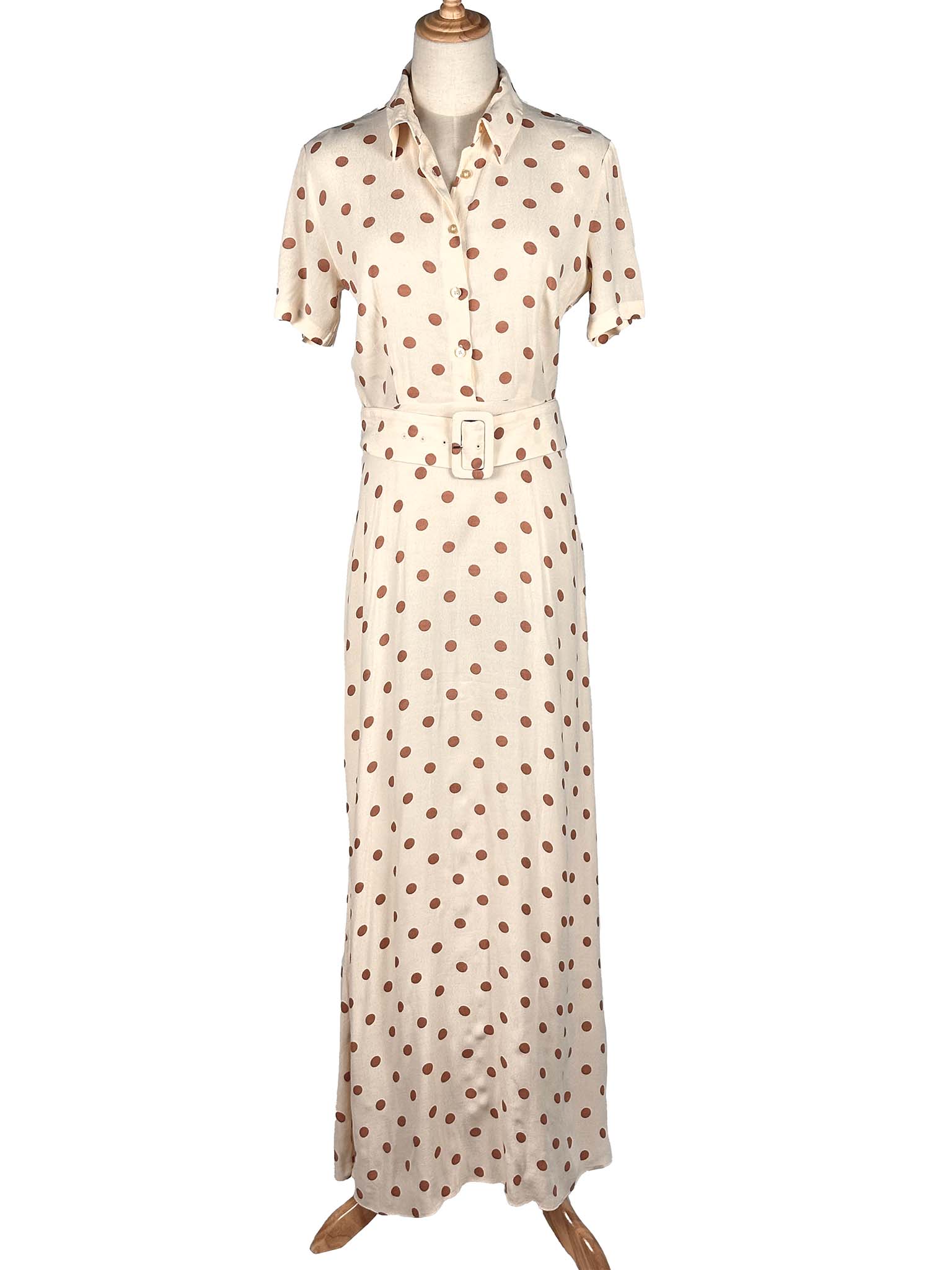 Long Zara polka dot dress on a mannequin against a white background