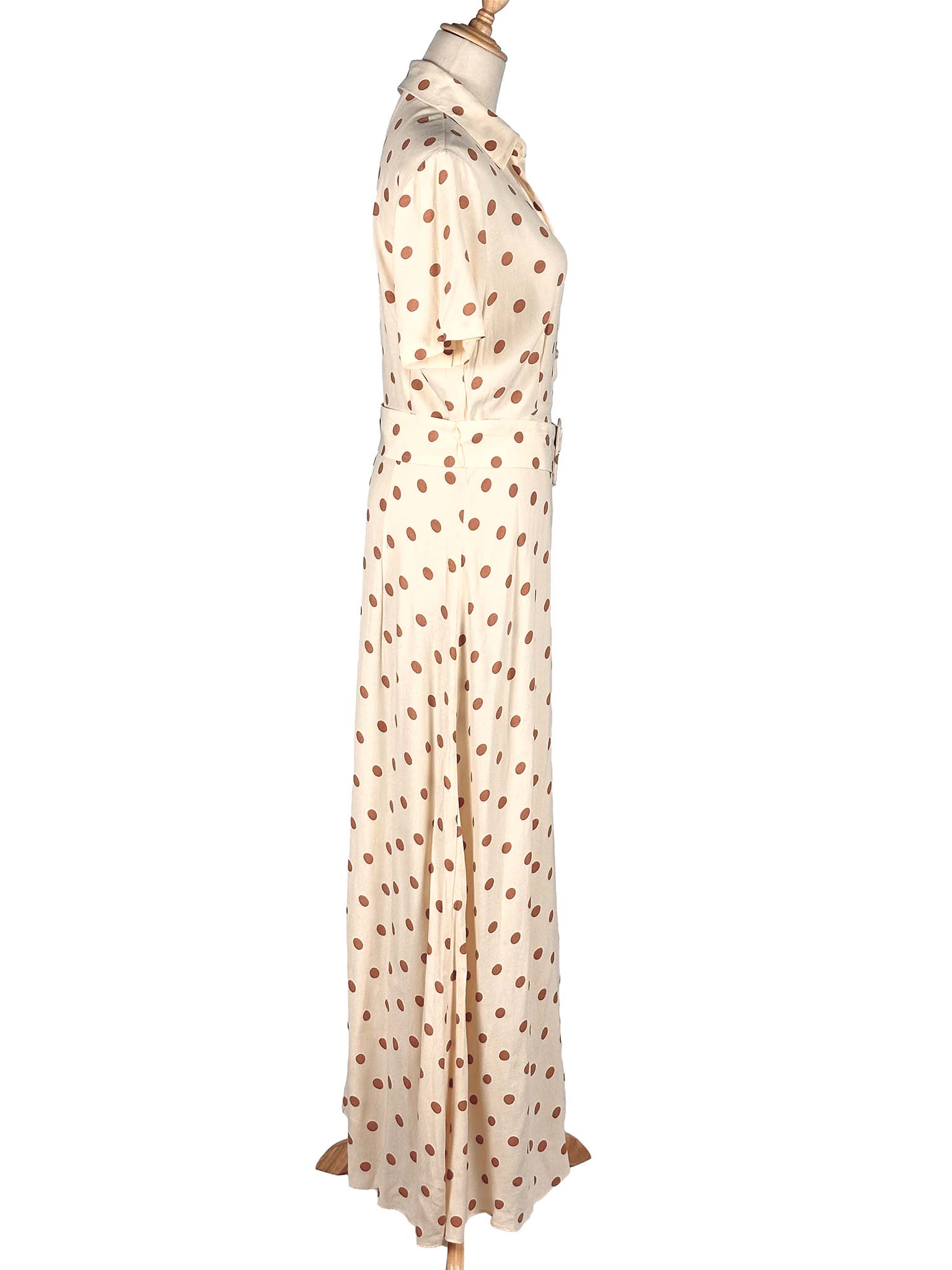Long, white Zara dress with a subtle pattern on a white background