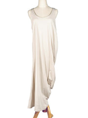 Beige sleeveless dress on a mannequin against a white background