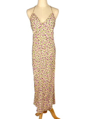 Floral dress on a mannequin against a white background