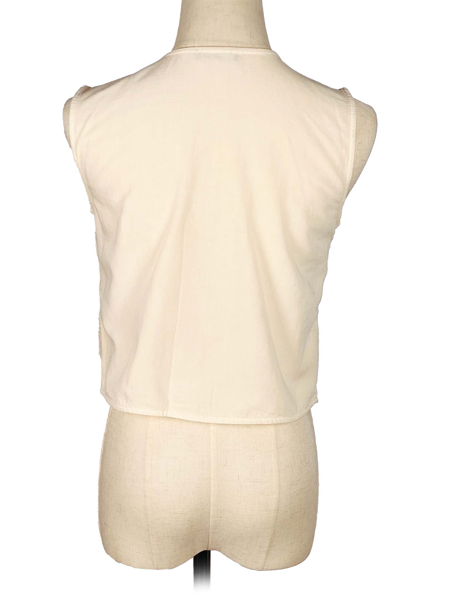 White vest on a mannequin against a white background