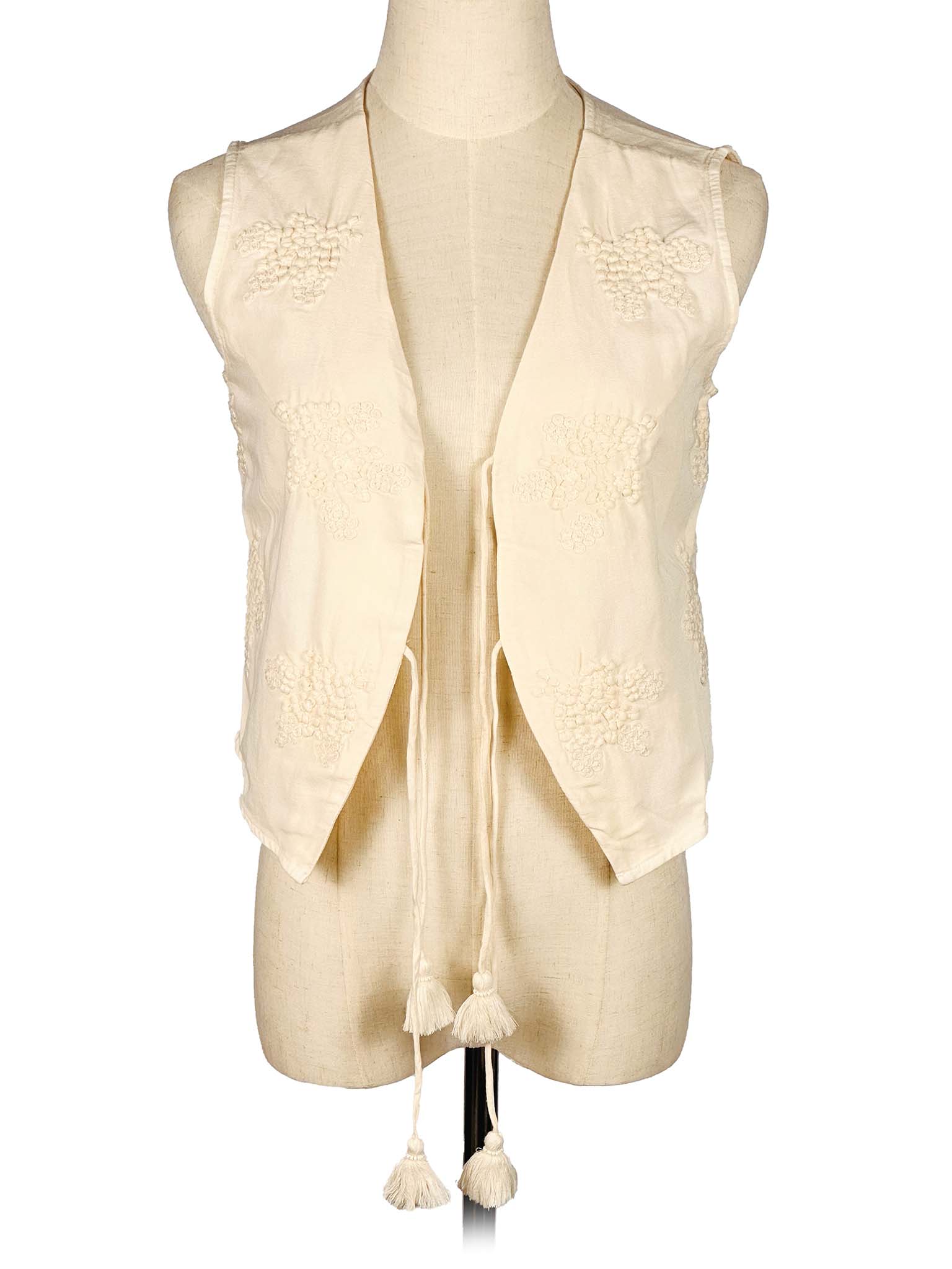 White vest on a mannequin against a white background
