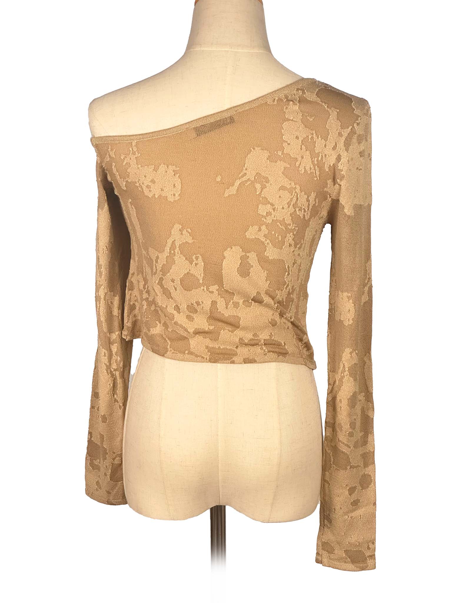 Golden Zara long-sleeve top on a mannequin with a white background