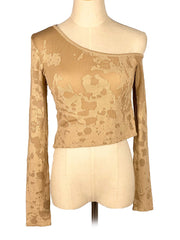 Golden Zara long-sleeve top on a mannequin with a white background