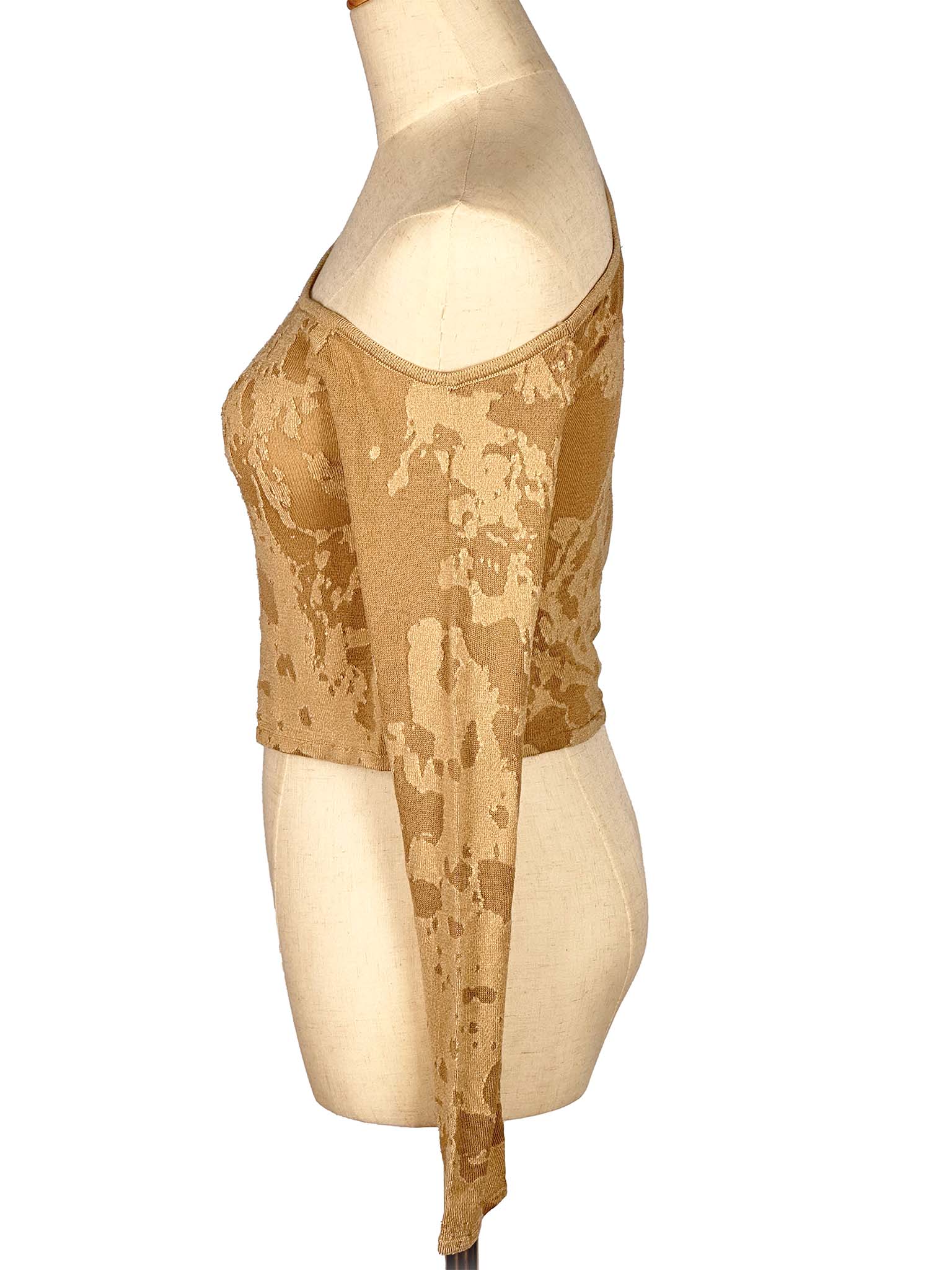 Golden Zara long-sleeve top on a mannequin with a white background