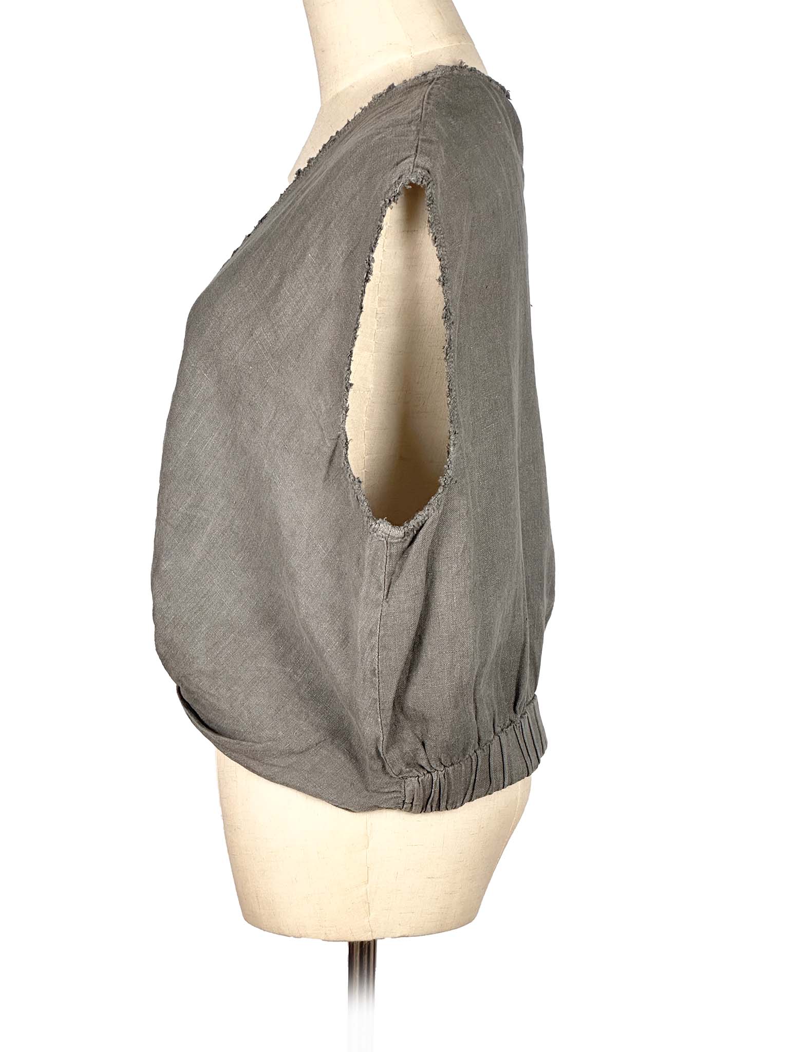 Zara gray sleeveless top on a mannequin against a white background