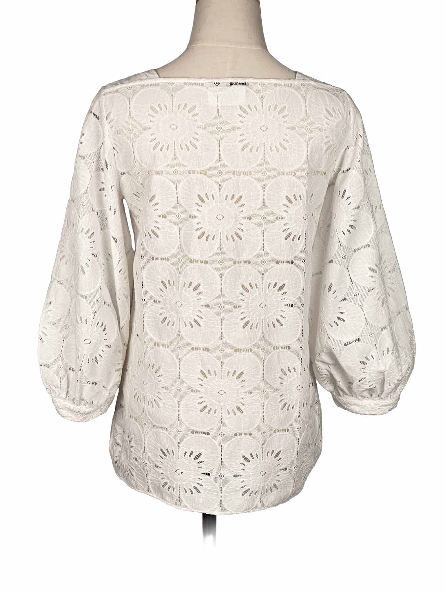 Beige Massimo Dutti top on a mannequin against a white background