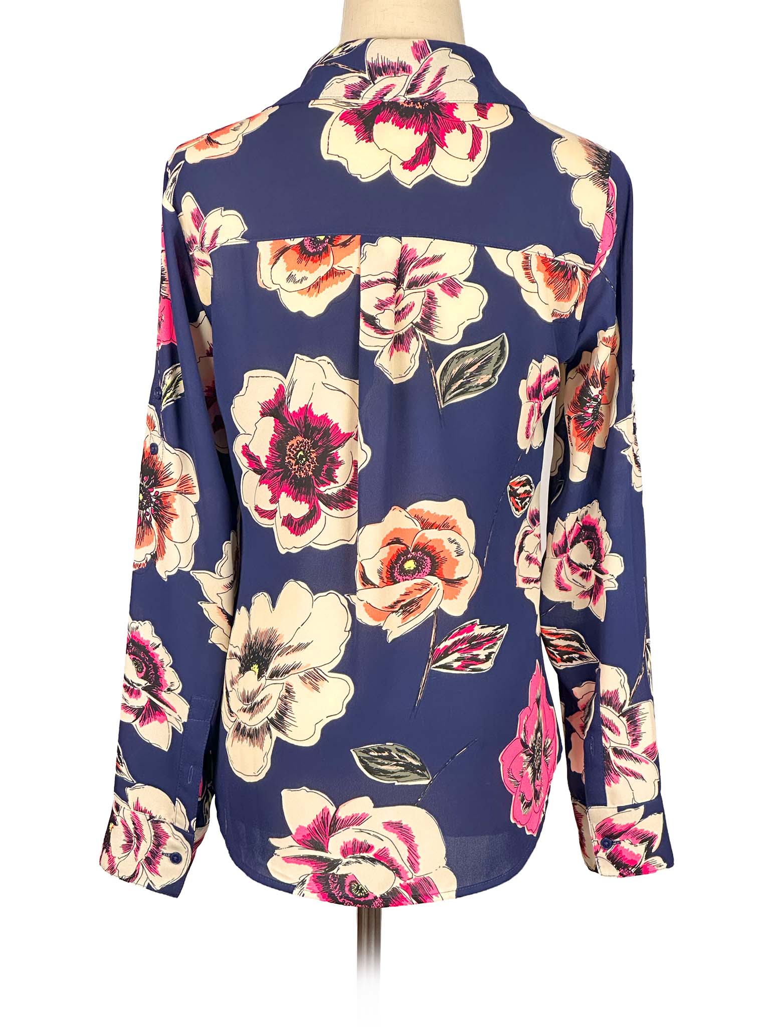 Floral Express blouse on a mannequin against a white background
