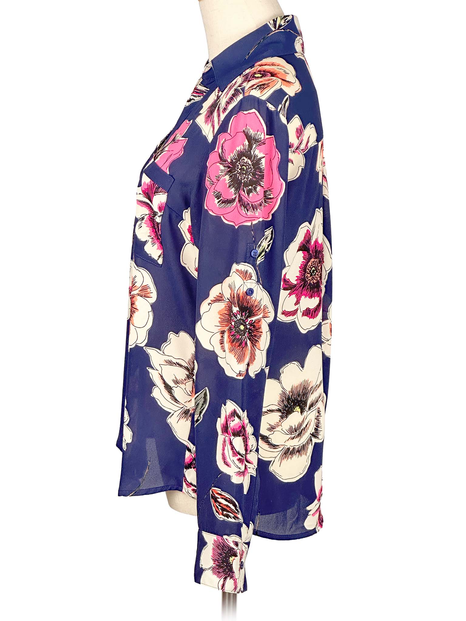 Floral Express blouse on a mannequin against a white background