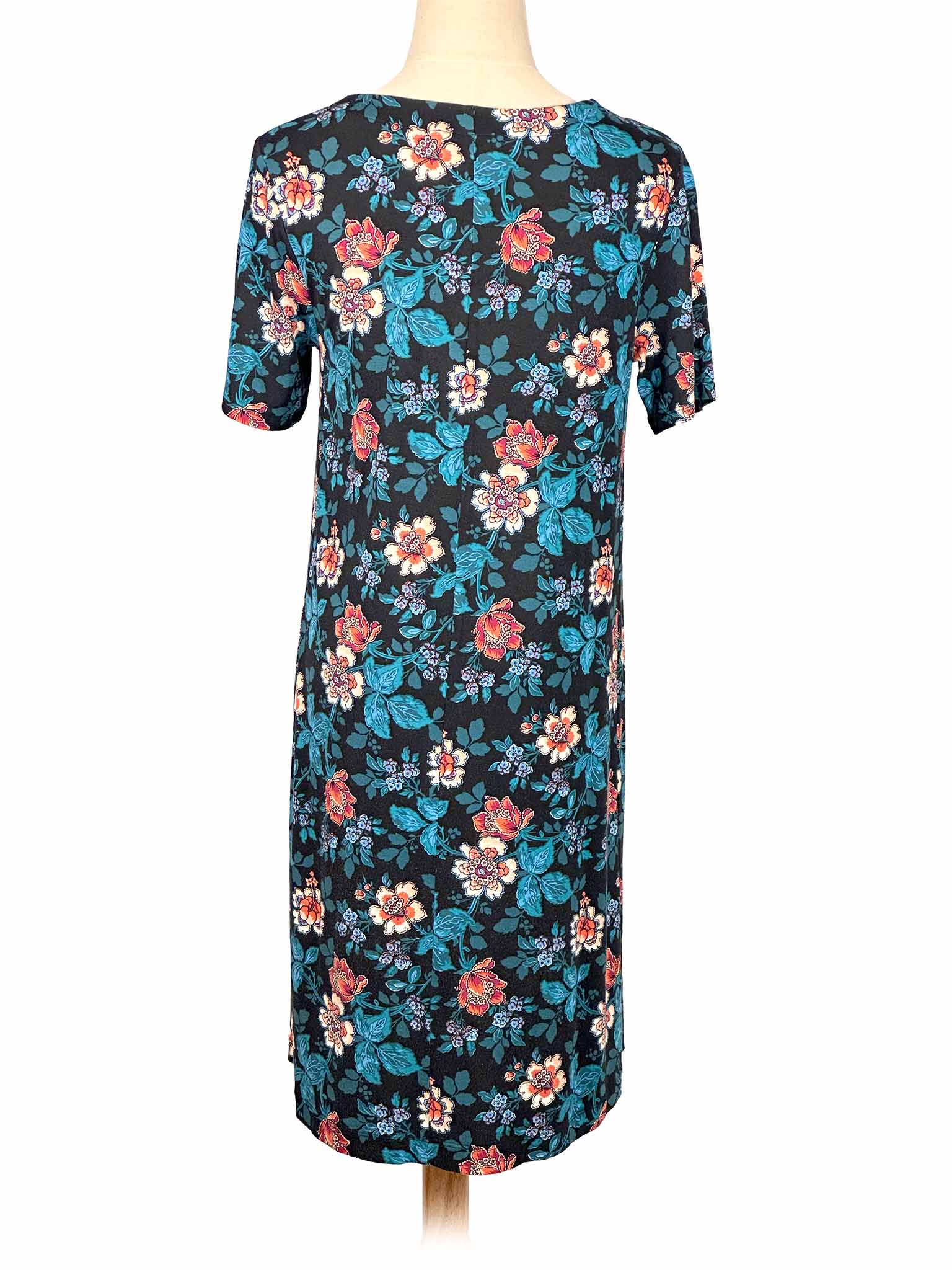 Floral Loft dress on a mannequin against a white background