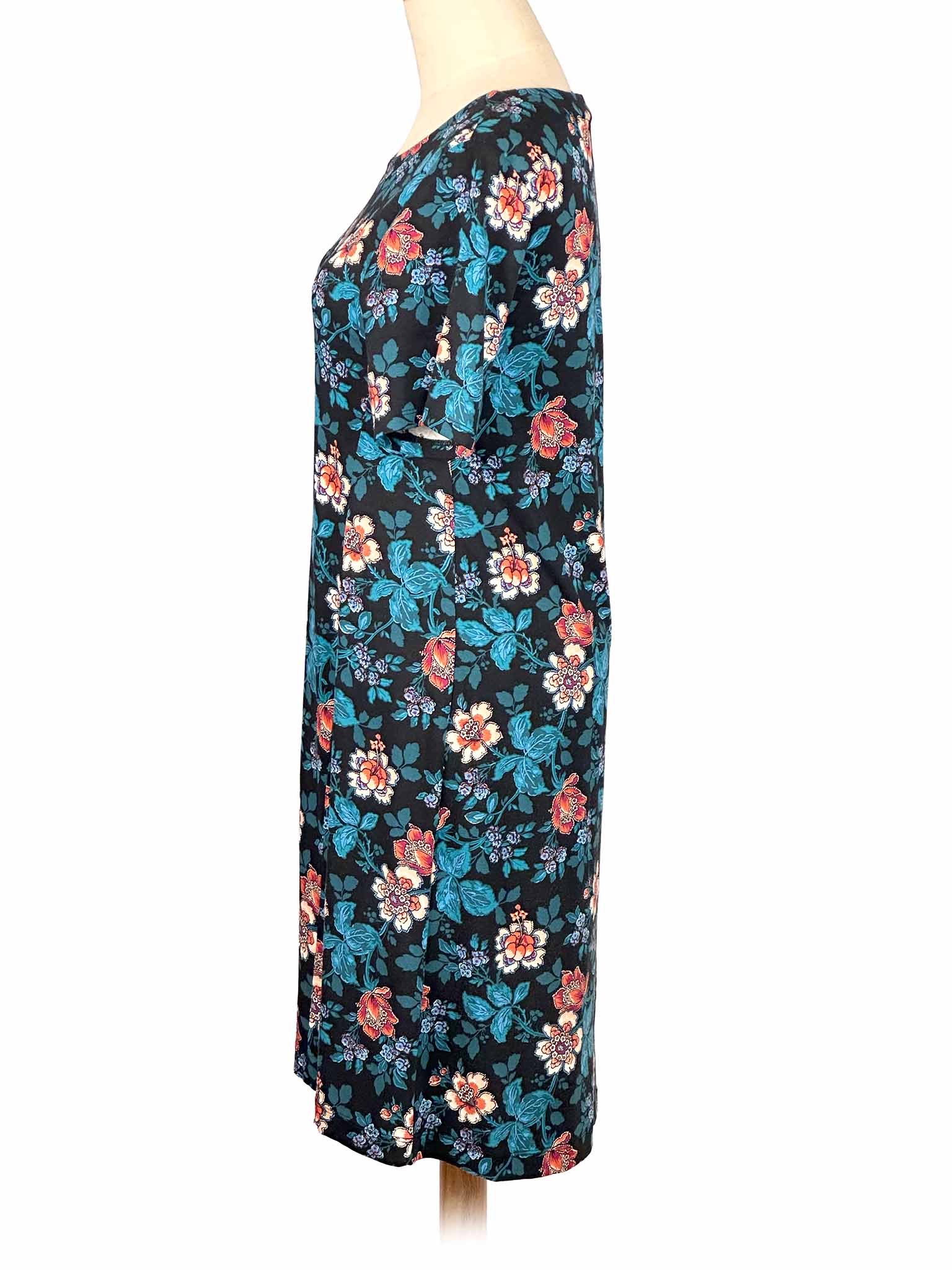 Floral Loft dress on a mannequin against a white background