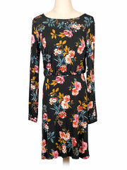 Loft floral dress on a mannequin against a white background