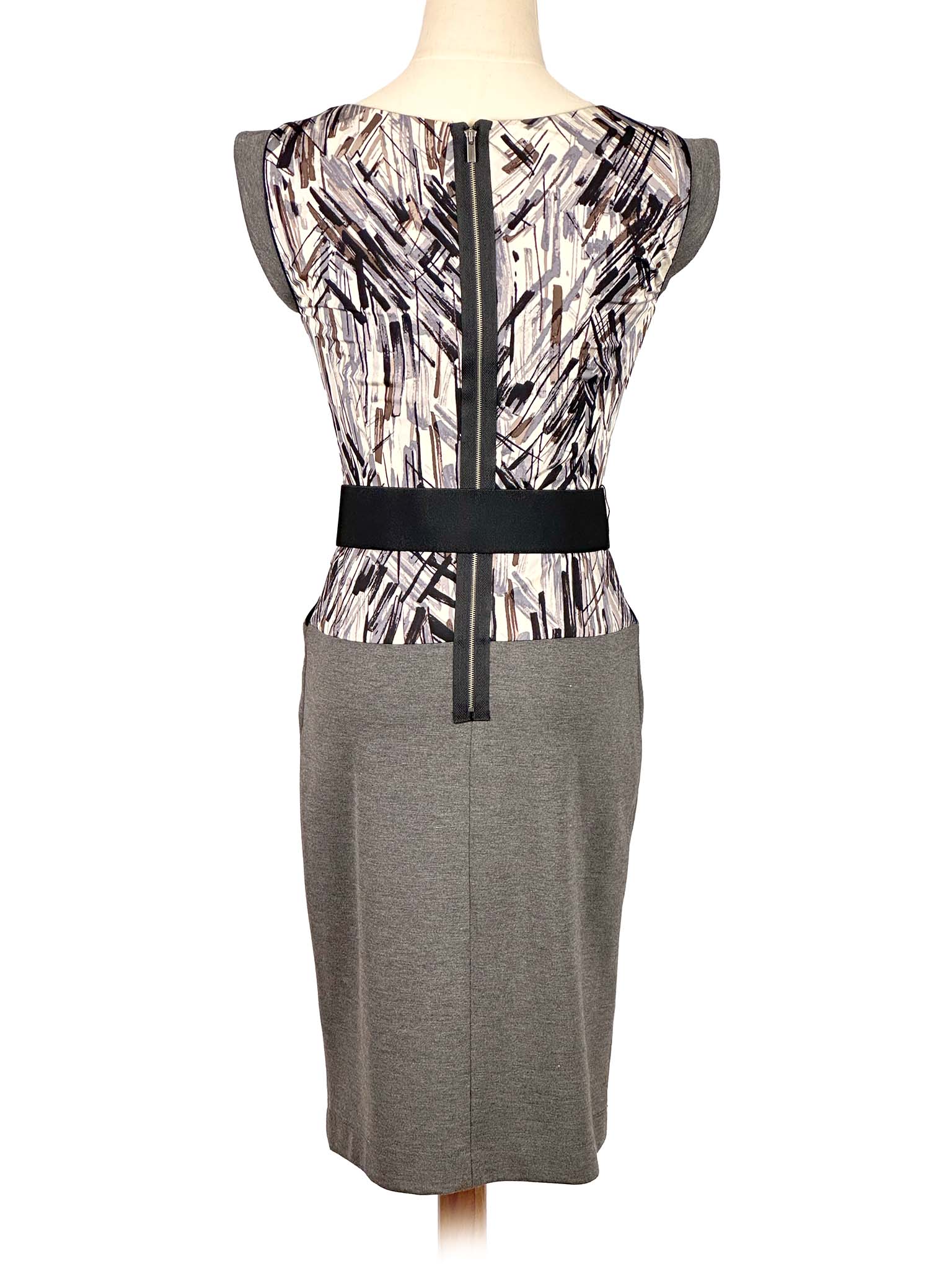 Gray BCBG MaxAzria dress with patterned details on a mannequin against a white background