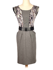 Gray BCBG MaxAzria dress with patterned details on a mannequin against a white background