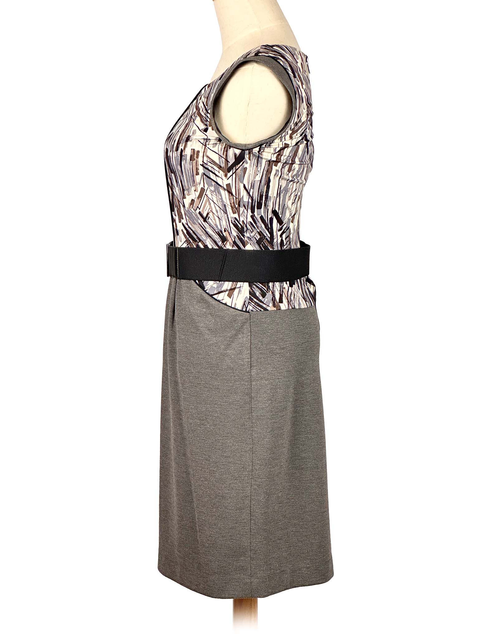 Gray BCBG MaxAzria dress with patterned details on a mannequin against a white background