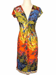 Colorful BCBG MaxAzria dress on a mannequin against a white background