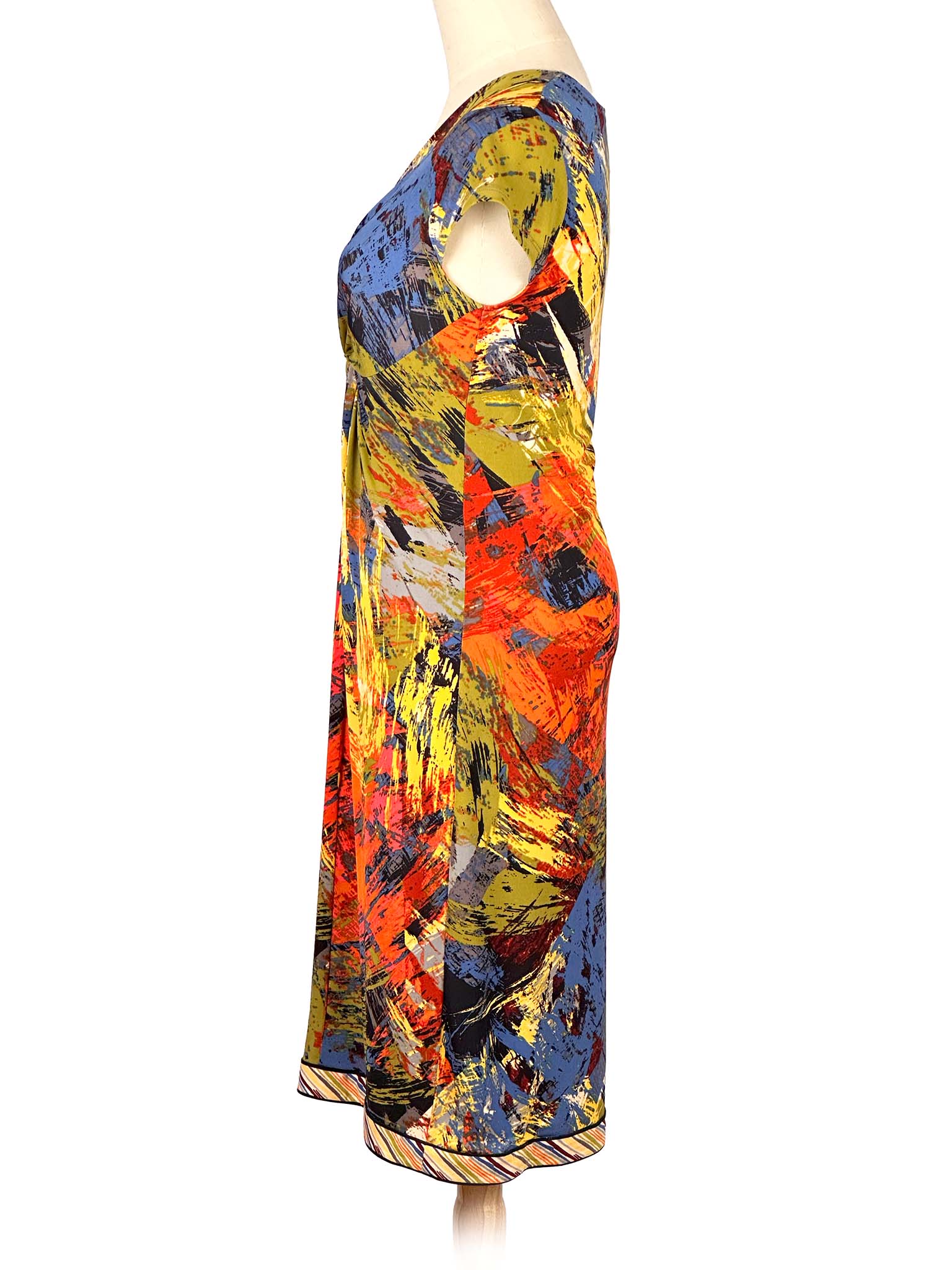 Colorful BCBG MaxAzria dress on a mannequin against a white background