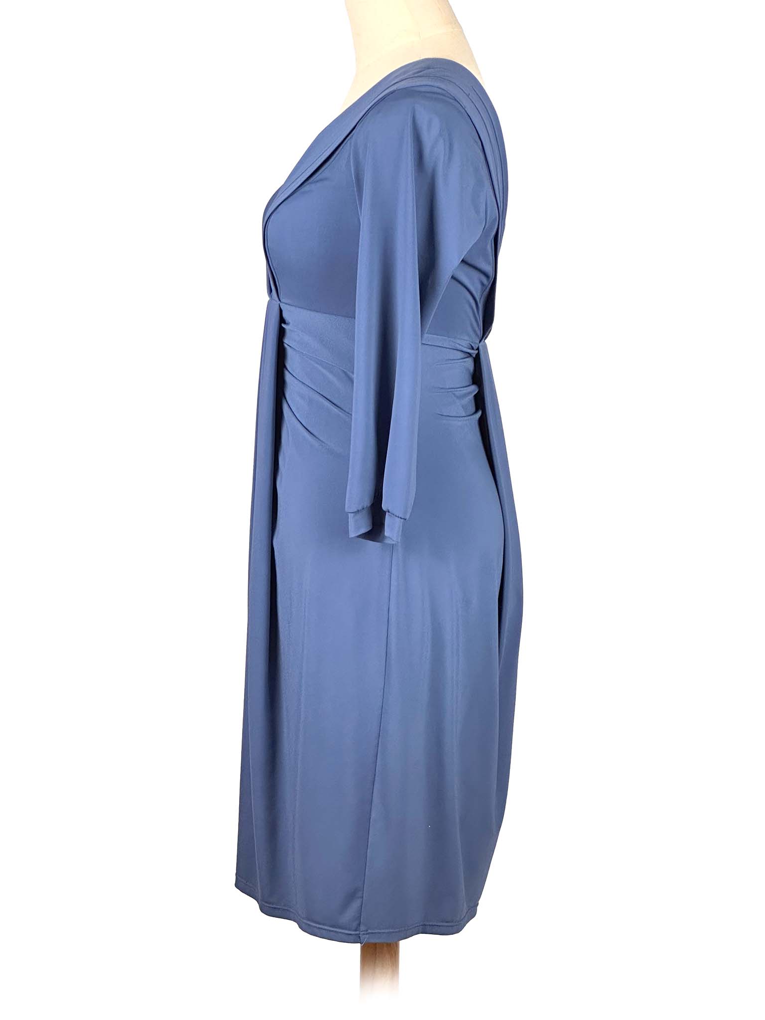 Blue BCBGMaxAzria dress on a mannequin against a white background