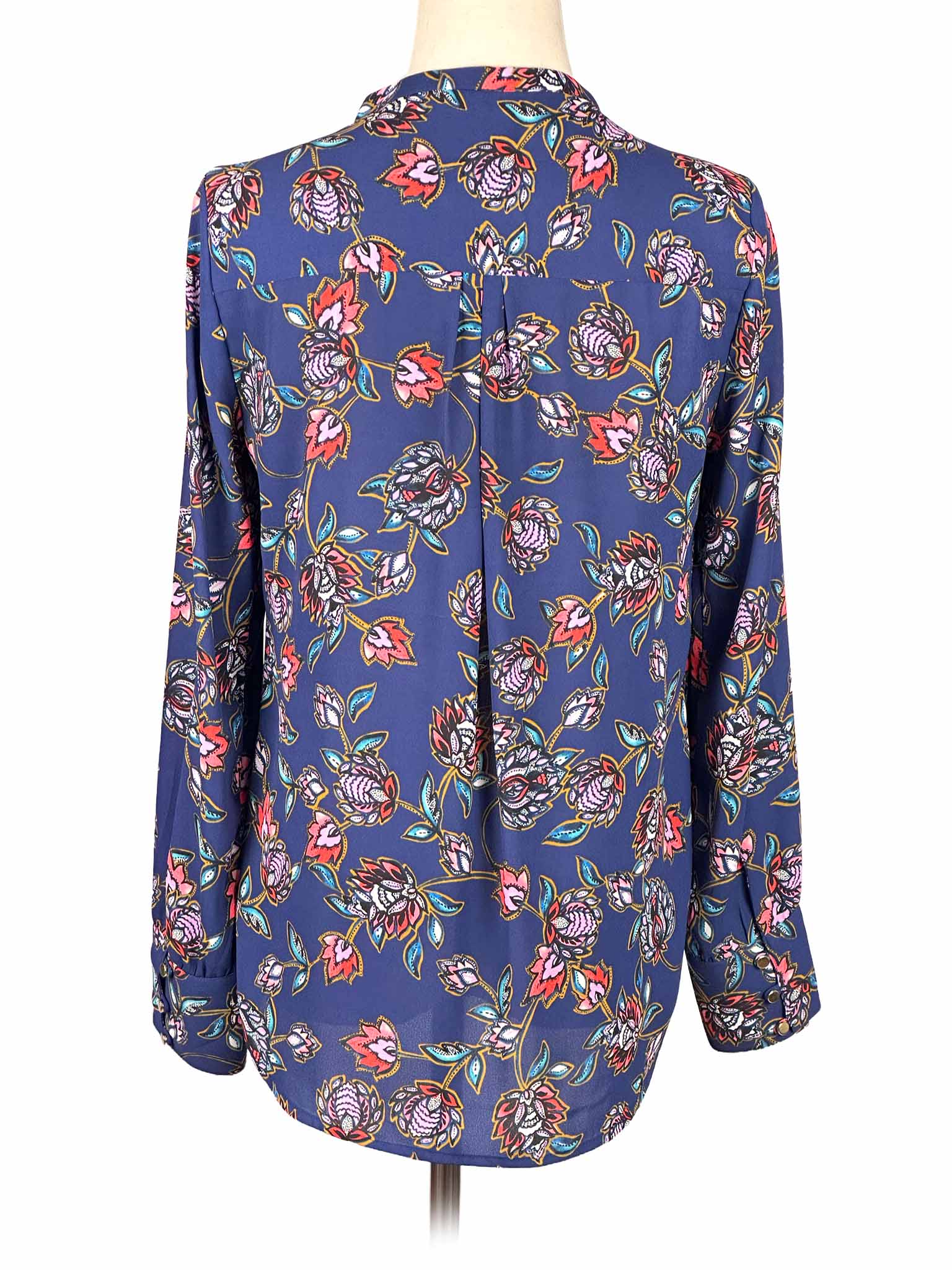 Floral-patterned Express blouse on a mannequin against a white background