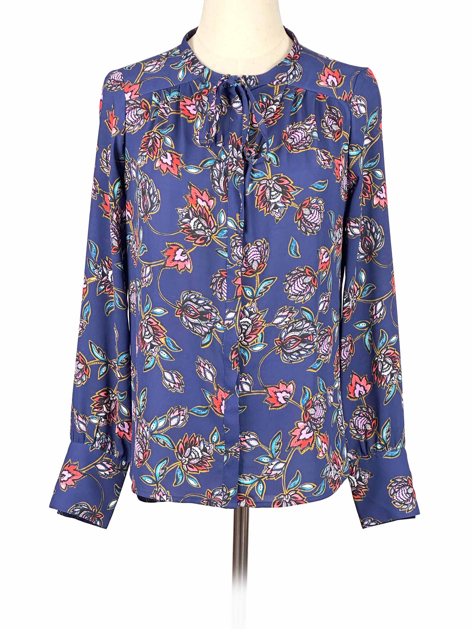 Floral-patterned Express blouse on a mannequin against a white background