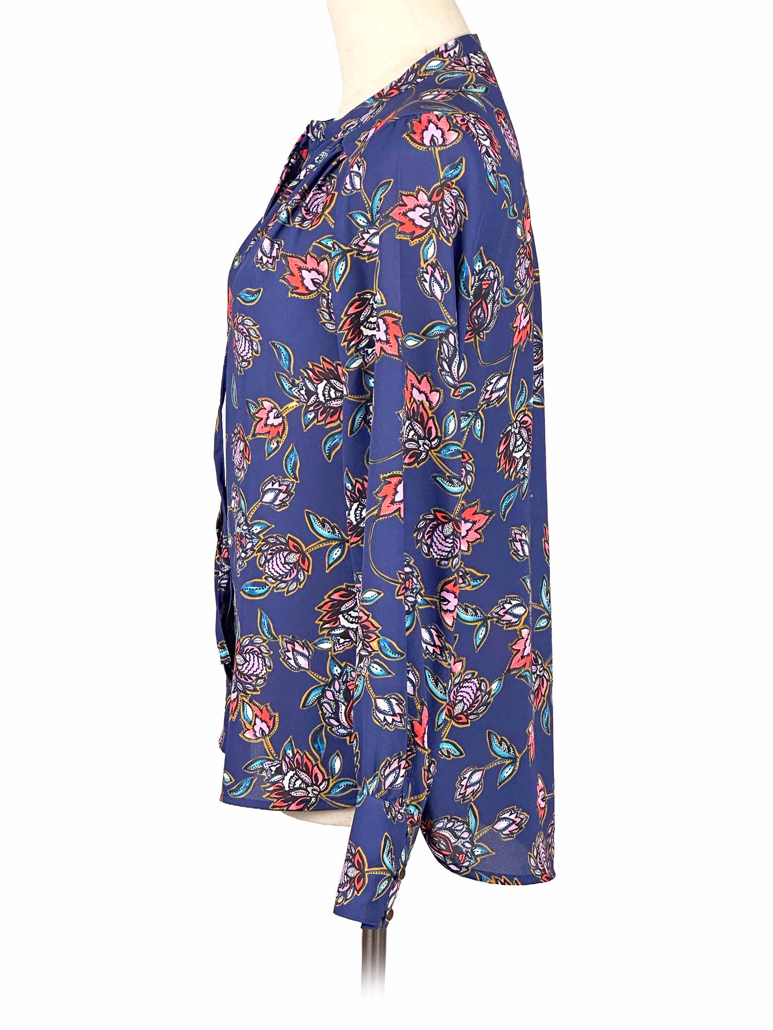 Floral-patterned Express blouse on a mannequin against a white background