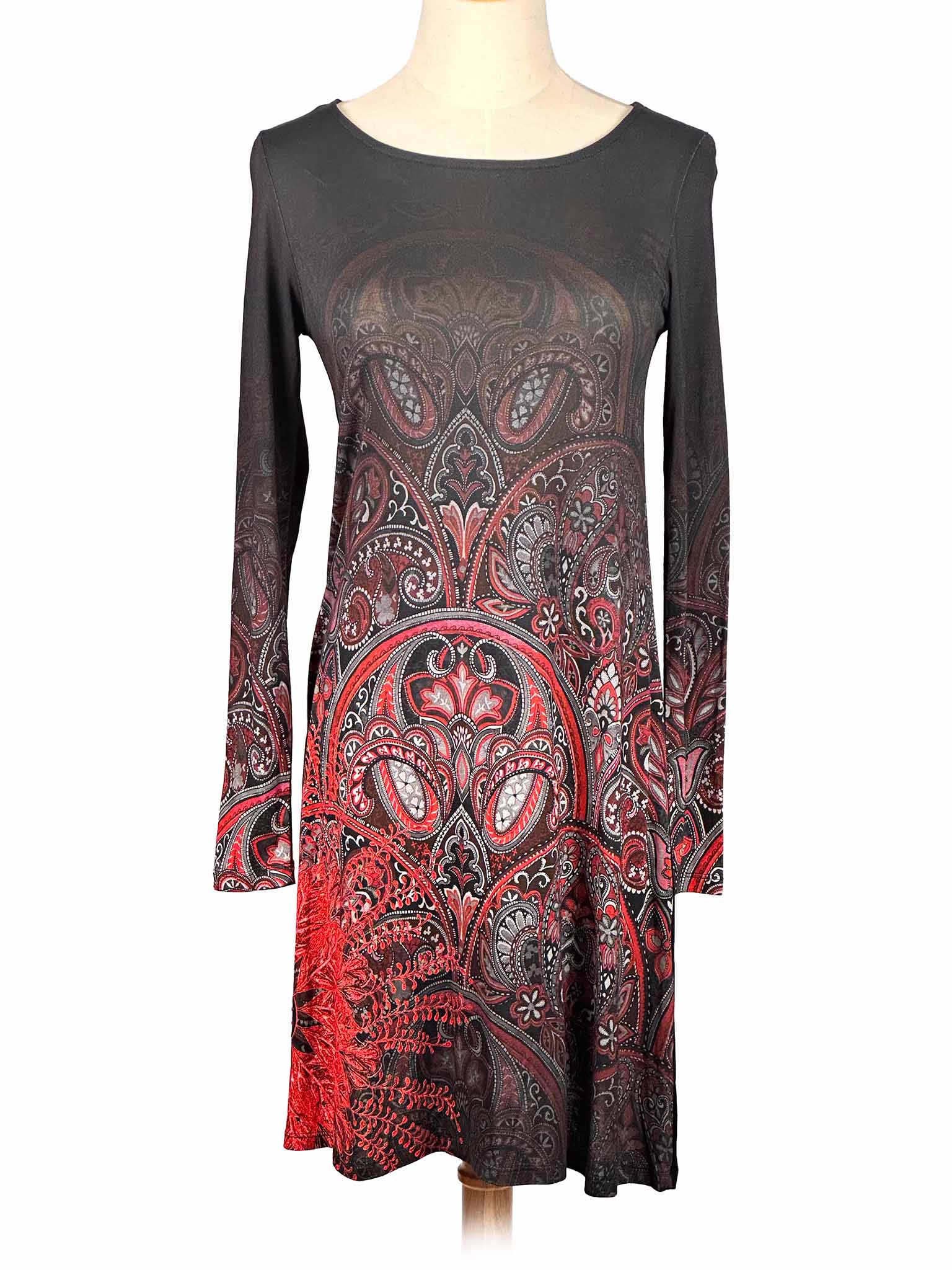Long-sleeve Desigual dress with red and black paisley pattern on a mannequin against a white background