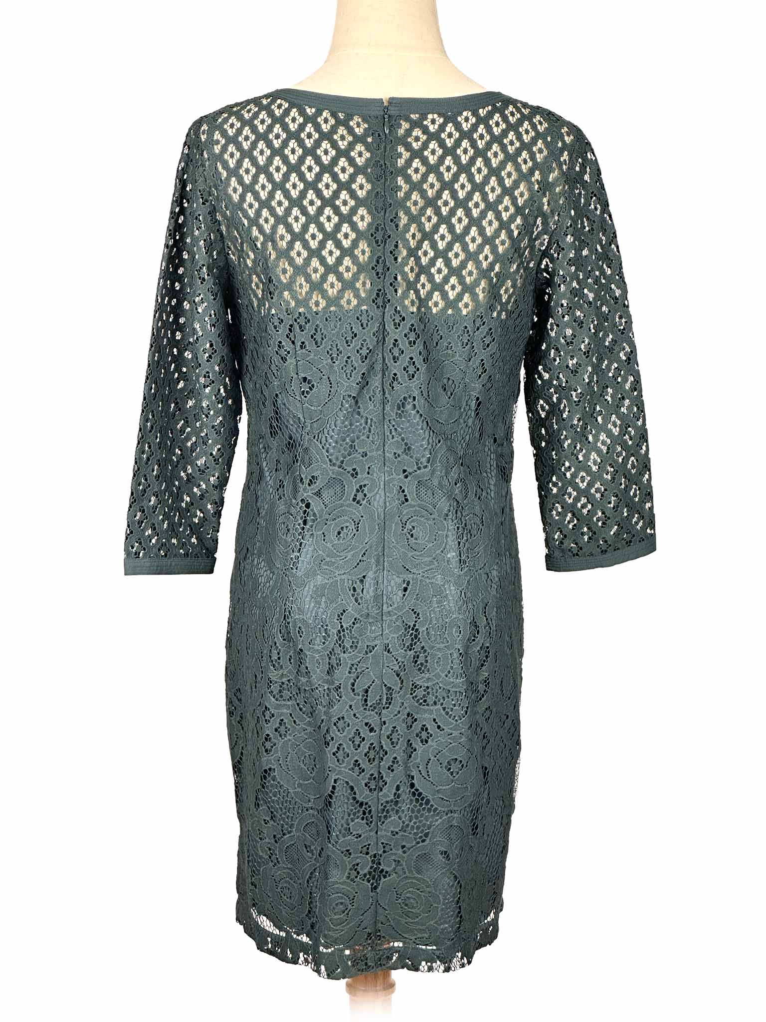 Green lace Loft dress on a mannequin against a white background