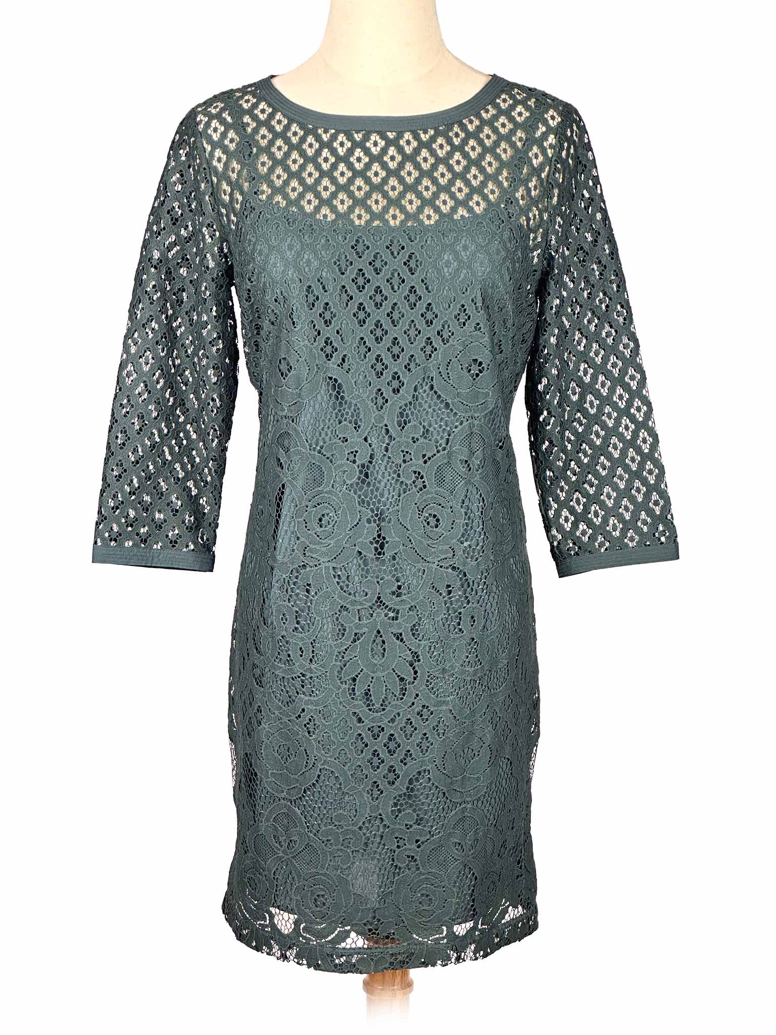 Green lace Loft dress on a mannequin against a white background