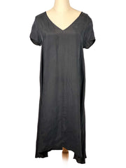 American Vintage black dress on a mannequin against a white background