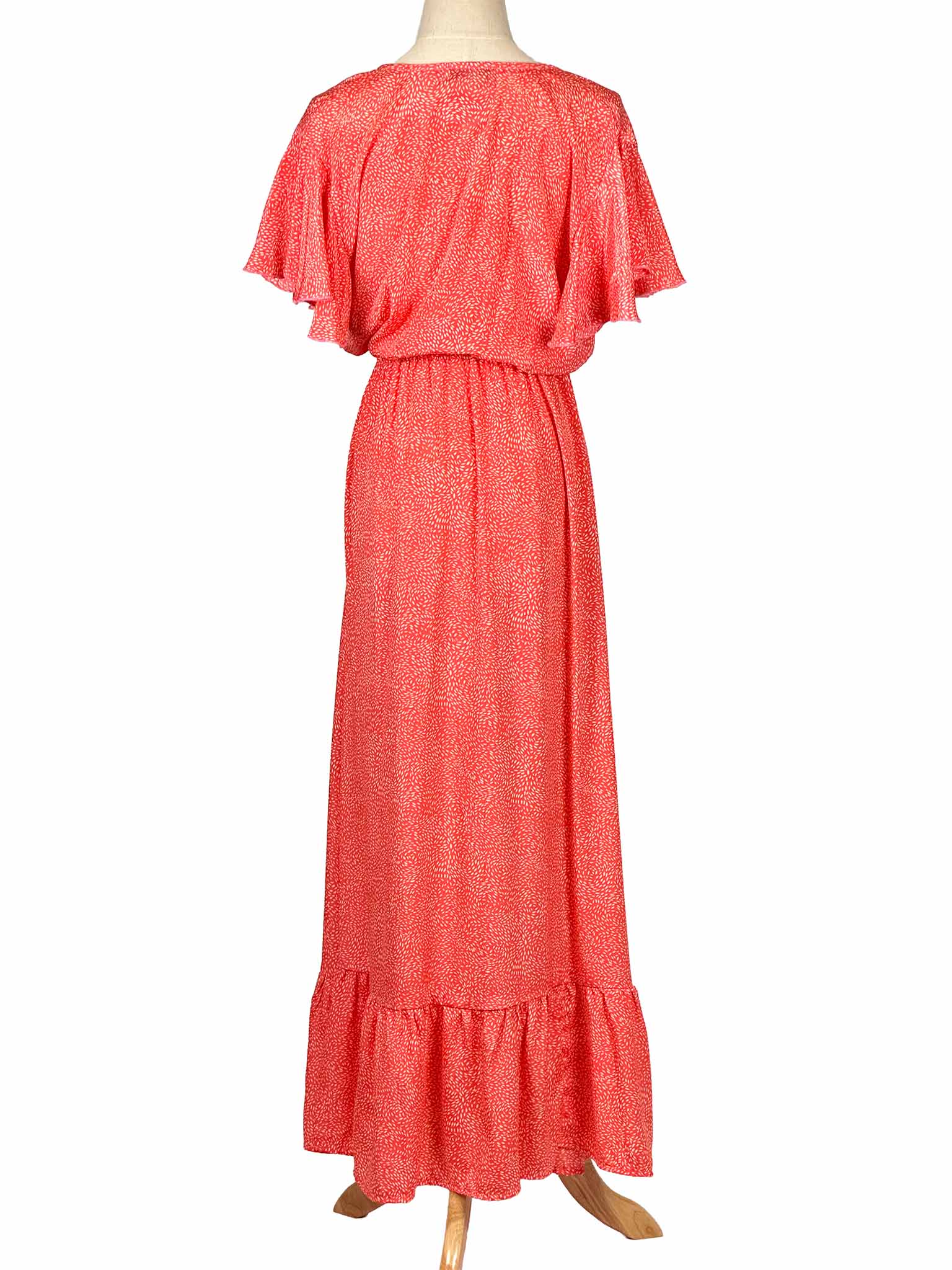 Tipsy Gipsy red patterned dress on a mannequin against a white background