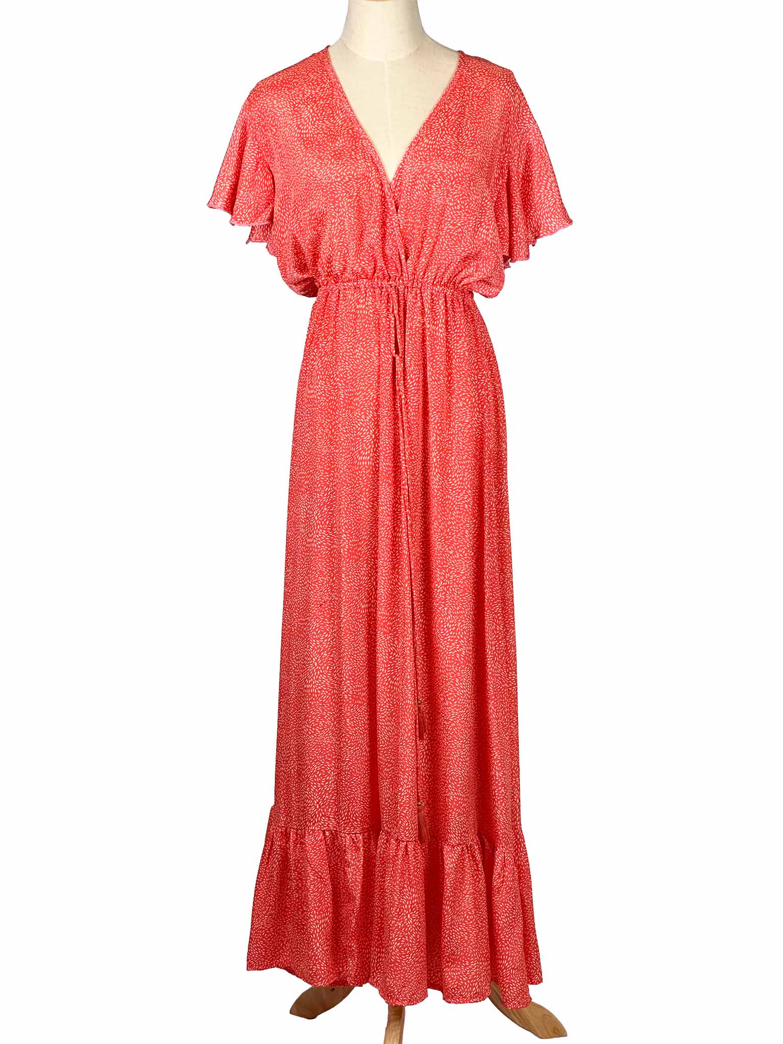 Tipsy Gipsy red patterned dress on a mannequin against a white background