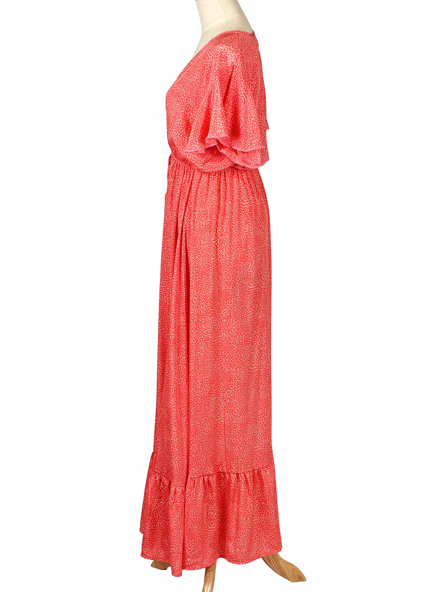 Tipsy Gipsy red patterned dress on a mannequin against a white background