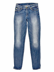 Pair of blue 7 For All Mankind jeans on a white background