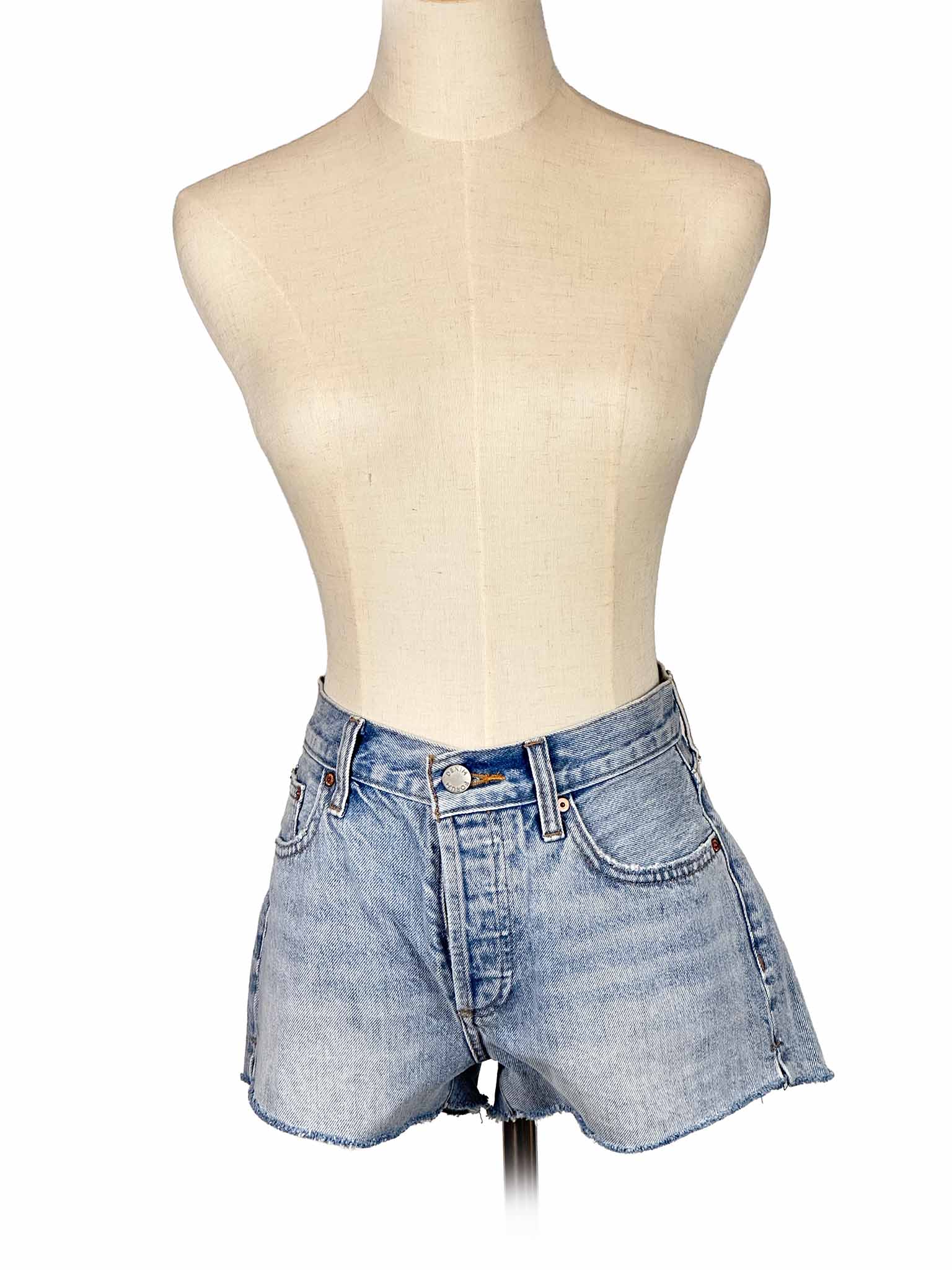Denim Forum shorts on a mannequin against a white background