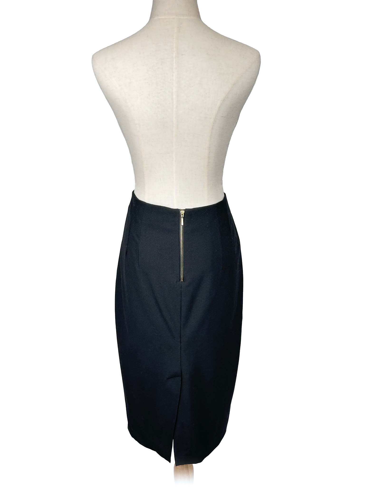 Zara black pencil skirt on a mannequin against a white background