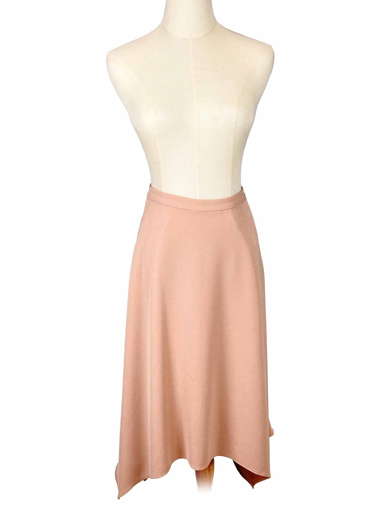Wilfred pink skirt on a mannequin against a white background