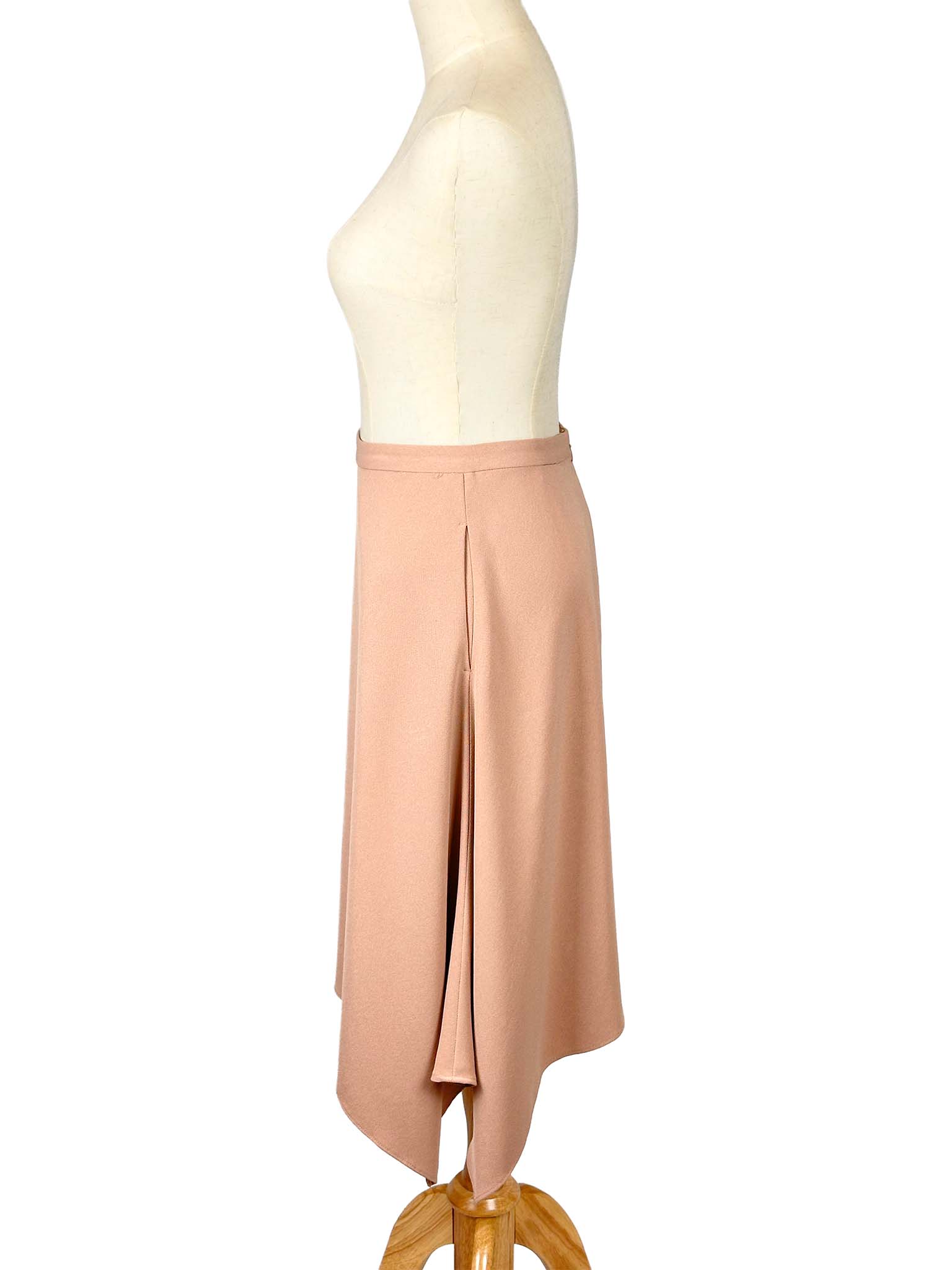 Wilfred pink skirt on a mannequin against a white background