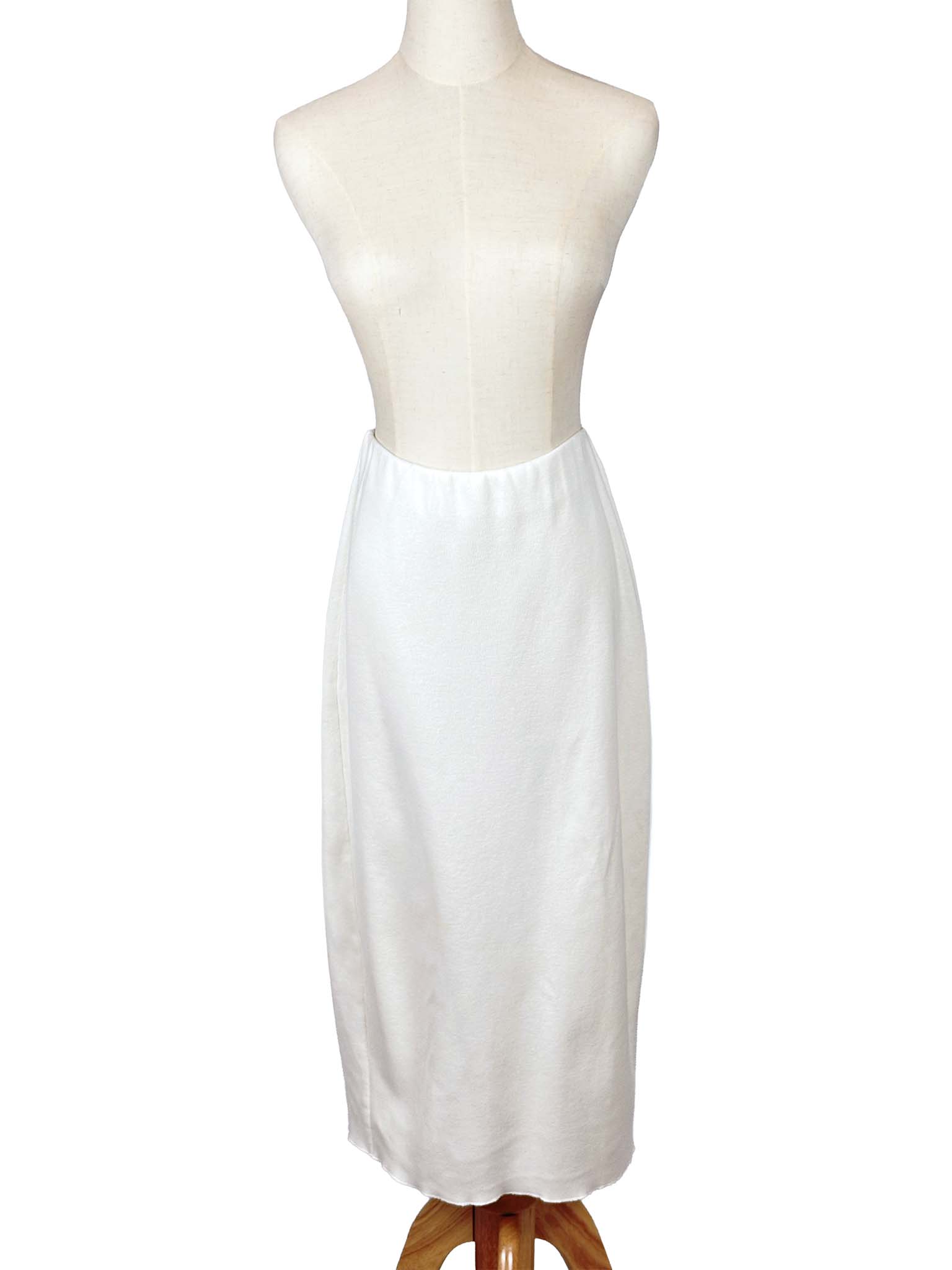 Zara white skirt on a mannequin against a white background