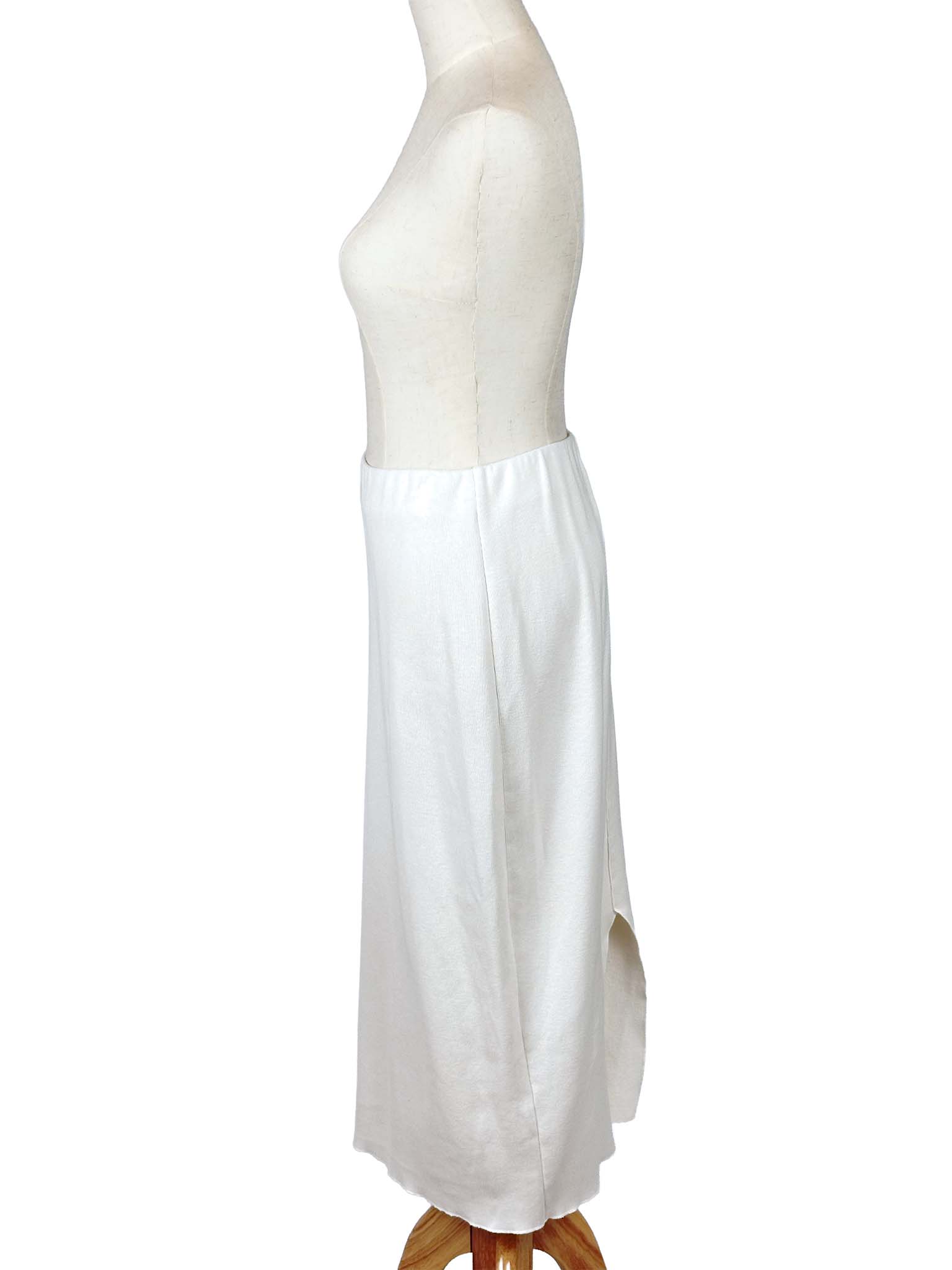 Zara white skirt on a mannequin against a white background