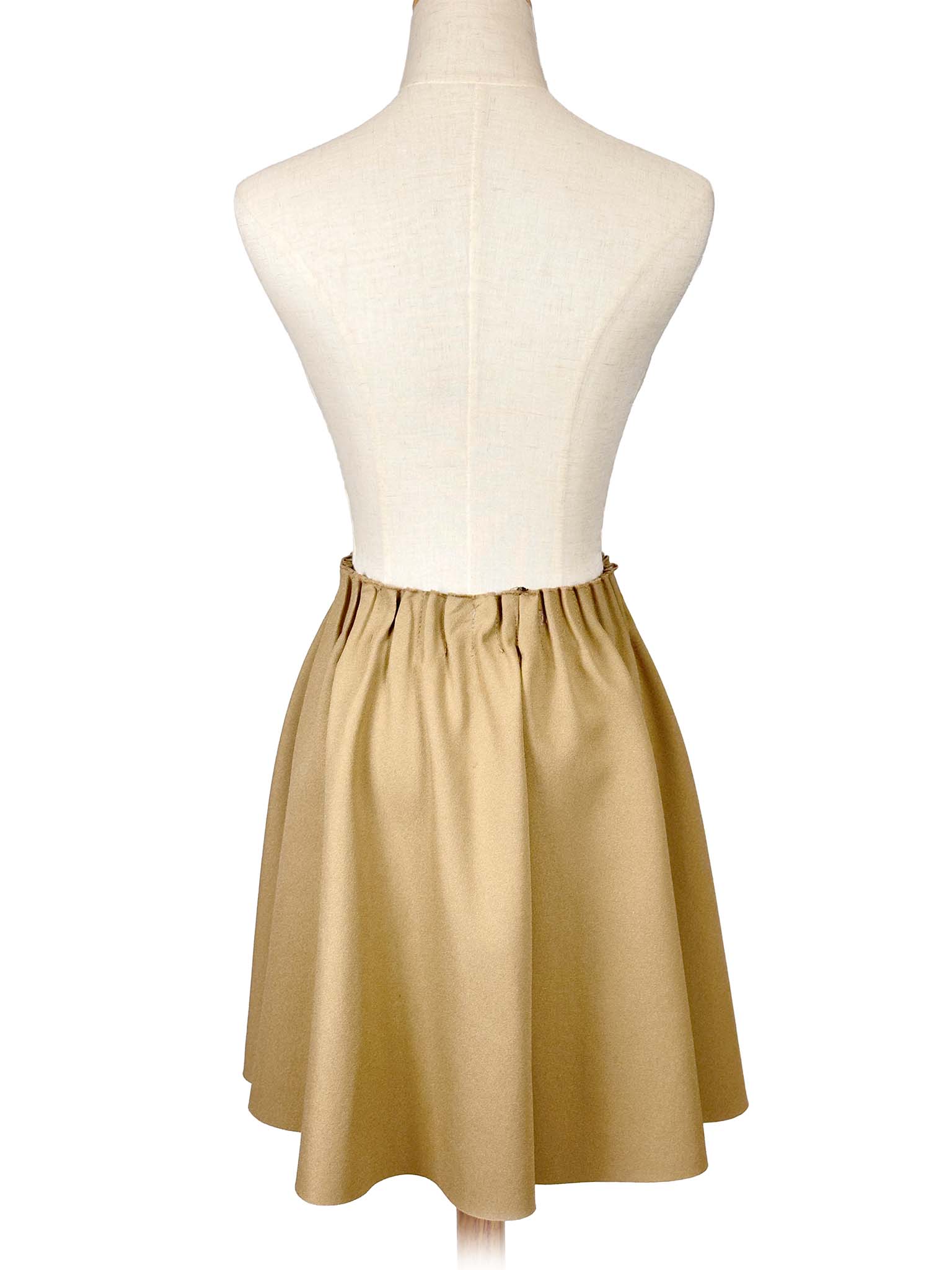 Zara beige circle skirt on a mannequin against a white background
