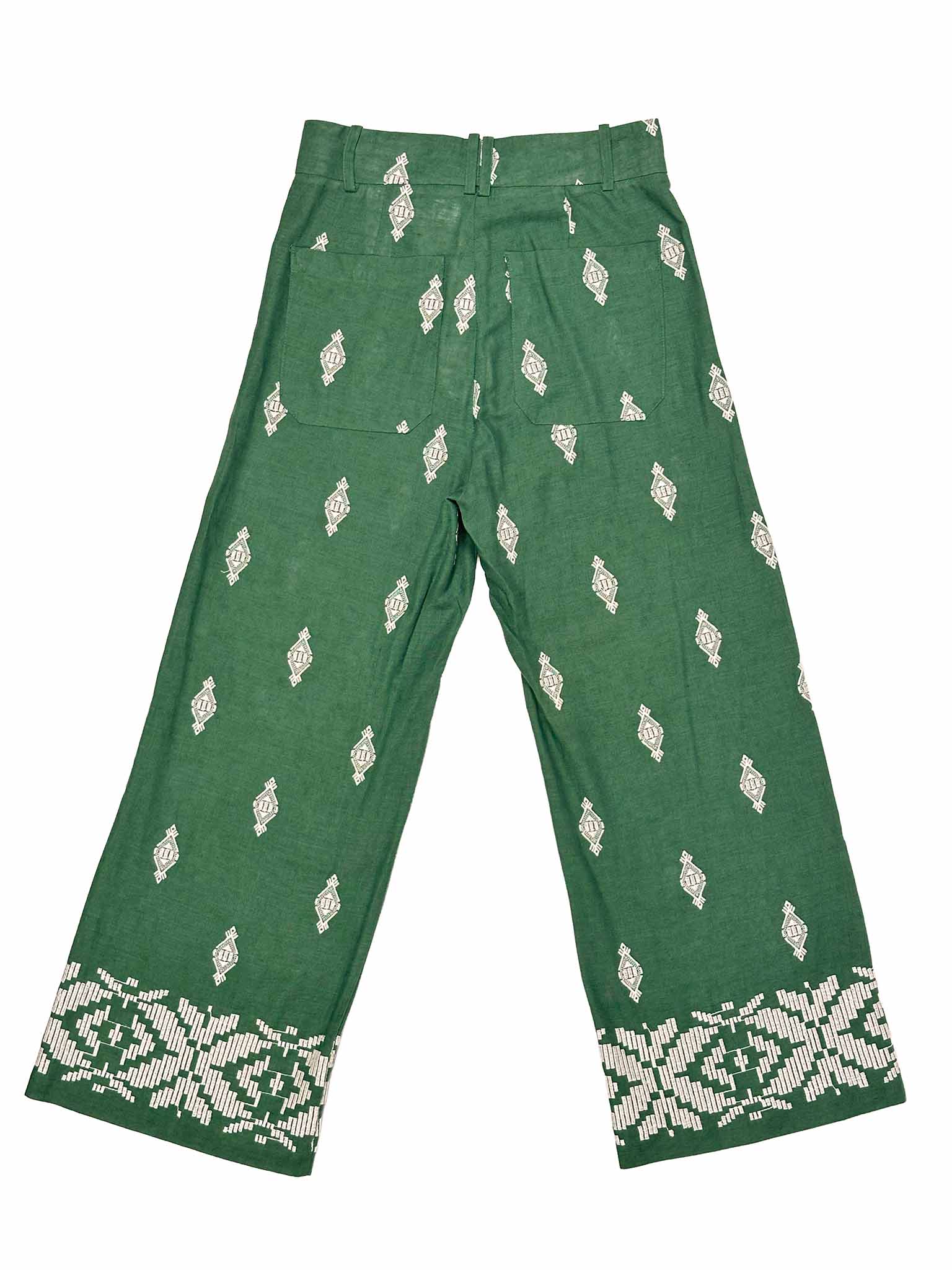 Zara green linen pants with white pattern on a white background