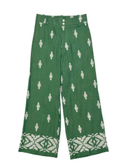 Zara green linen pants with white pattern on a white background
