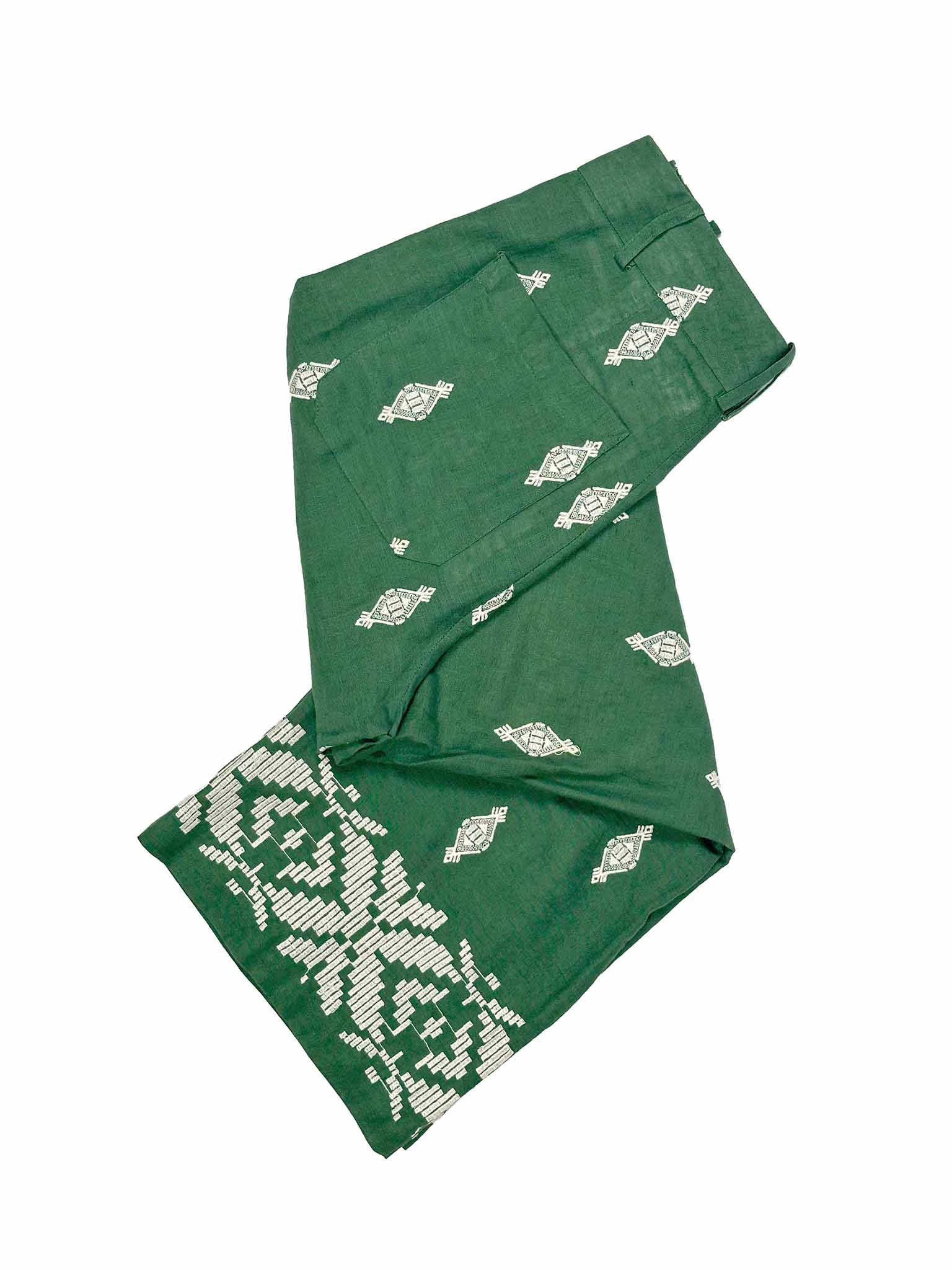 Zara green linen pants with white pattern on a white background