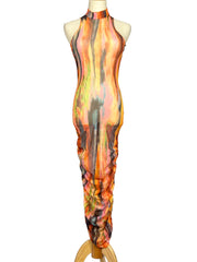 Mannequin wearing a colorful SNDYS. dress with abstract patterns on a white background