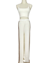 Mannequin wearing a Moeva white sleeveless top and pants set on a white background
